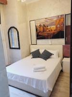 Posteľ alebo postele v izbe v ubytovaní Captin Home Roma