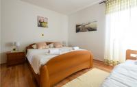 Posteľ alebo postele v izbe v ubytovaní 2 Bedroom Cozy Home In Krnica