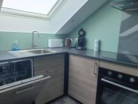 Kuchnia lub aneks kuchenny w obiekcie Les toits - Audun le Tiche - Appartement 3 chambres