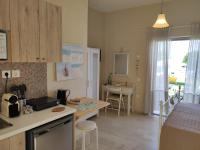 Thalassa Apartments & Studiosにあるキッチンまたは簡易キッチン