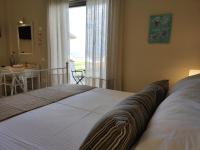 Thalassa Apartments & Studiosにあるベッド