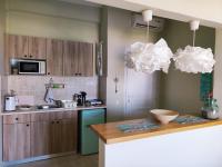 Thalassa Apartments & Studiosにあるキッチンまたは簡易キッチン