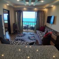 TV a/nebo společenská místnost v ubytování Panorama Apartment with a charming sea view near Alexandria and Burg ElArab Intl Airport with Free wifi شقة باطلالة ساحرة على البحر اول الساحل الشمالي