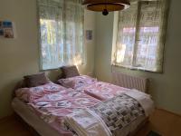 Łóżko lub łóżka w pokoju w obiekcie Relax Home/Lazit-Lak