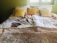 Łóżko lub łóżka w pokoju w obiekcie Relax Home/Lazit-Lak