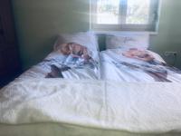 Łóżko lub łóżka w pokoju w obiekcie Relax Home/Lazit-Lak