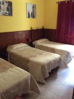 Posteľ alebo postele v izbe v ubytovaní Casa Garome 14 PARKING GRATIS