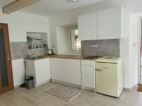 Kuchyň nebo kuchyňský kout v ubytování Apartmány u Koláčků