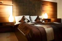Posteľ alebo postele v izbe v ubytovaní Hotel Barbakan