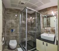 A bathroom at Marcello Hotel