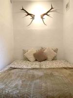 Łóżko lub łóżka w pokoju w obiekcie Valberg 8 couchages cocon familial