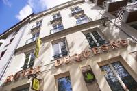 a sign on the side of a building at Logis Hôtel Duquesne in Nantes