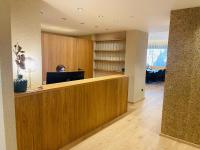 A television and/or entertainment centre at Residence Hotel Alpinum
