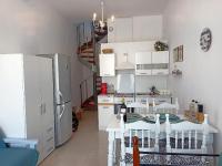 Kuchyň nebo kuchyňský kout v ubytování Amphitrite's Haven - Cycladic House in Marpissa, Paros