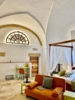 A bed or beds in a room at Il Nachiro