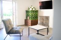 Televízia a/alebo spoločenská miestnosť v ubytovaní Seeappartements Christiane Haus 97