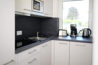 Kuchyňa alebo kuchynka v ubytovaní Seeappartements Christiane Haus 97