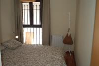 A bed or beds in a room at El Rinconcico