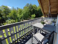 Balkón nebo terasa v ubytování Lake House Sebanc