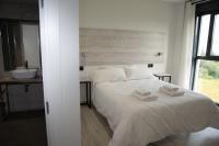 Posteľ alebo postele v izbe v ubytovaní Hotel Chips Fene