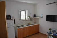 Kuchyňa alebo kuchynka v ubytovaní Apartments Burcul Pag