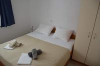 Posteľ alebo postele v izbe v ubytovaní Apartments Burcul Pag