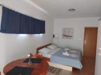Posteľ alebo postele v izbe v ubytovaní Apartments Burcul Pag