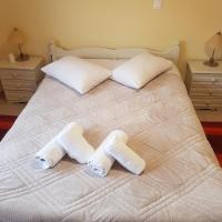 Posteľ alebo postele v izbe v ubytovaní KORONI MARE -Sea view apartment/διαμέρισμα με θέα στην θάλασσα