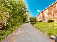 Vonkajšia záhrada v ubytovaní MC Tourisme - Splendide & cosy appartement avec piscine, tennis & parking