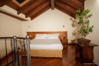 Posteľ alebo postele v izbe v ubytovaní Hotel Flora