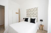 Łóżko lub łóżka w pokoju w obiekcie Le Concorde 3 - Appartement 2 chambres - 8 pers - Terrasse - Clim