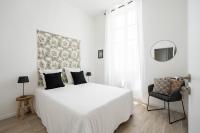 Łóżko lub łóżka w pokoju w obiekcie Le Concorde 3 - Appartement 2 chambres - 8 pers - Terrasse - Clim