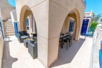 Balkón nebo terasa v ubytování VILLA-CAPRICHO DUNAS DE LA MATA 3