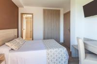 Posteľ alebo postele v izbe v ubytovaní Hotel Olympia Ronda II