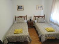 A bed or beds in a room at LOPEZ DE GOMARA 57