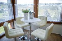 Posezení v ubytování Hotel Villa Golf Cihelny