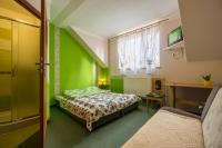 Posteľ alebo postele v izbe v ubytovaní Harmont Montis- dawna Zającówka- IDEALNA lokalizacja - leśna enklawa w centrum miasta! Sauna, masaże, zabiegi spa!