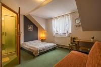 Posteľ alebo postele v izbe v ubytovaní Harmont Montis- dawna Zającówka- IDEALNA lokalizacja - leśna enklawa w centrum miasta! Sauna, masaże, zabiegi spa!