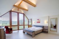 Postel nebo postele na pokoji v ubytování Hotel Villa Golf Cihelny
