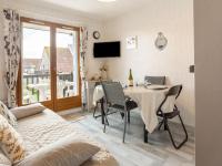 Televízia a/alebo spoločenská miestnosť v ubytovaní Apartment Fleur Marine-31 by Interhome