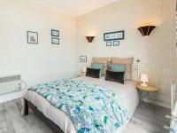 Łóżko lub łóżka w pokoju w obiekcie Apartment La Plage-2 by Interhome
