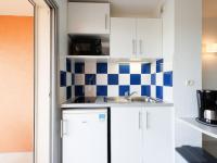 Kuchyňa alebo kuchynka v ubytovaní Apartment Primavera-2 by Interhome