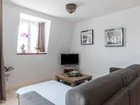 Telewizja i/lub zestaw kina domowego w obiekcie Apartment Maïlys by Interhome