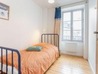 Posteľ alebo postele v izbe v ubytovaní Apartment La Cancalaise by Interhome