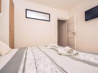 Posteľ alebo postele v izbe v ubytovaní Apartment Matanovi Dvori-3 by Interhome