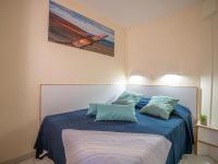 Posteľ alebo postele v izbe v ubytovaní Apartment L'Esquinade - G4 125 by Interhome