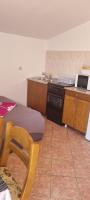 Kuchyňa alebo kuchynka v ubytovaní Apartments Anđa near Queen Beach