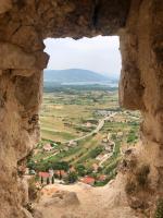 a view from a window in a rock cliff at Apartman ANA in Vrlika