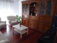 Posezení v ubytování Vivienda amplia y luminosa a escasos metros de la playa de Cangas.