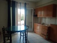 A kitchen or kitchenette at Κηπούπολη Kepoupolis Apartment